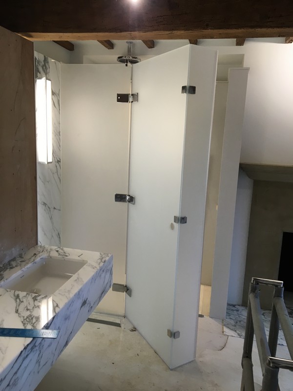 Bespoke frosted glass shower enclosure in New Malden luxury bathroom